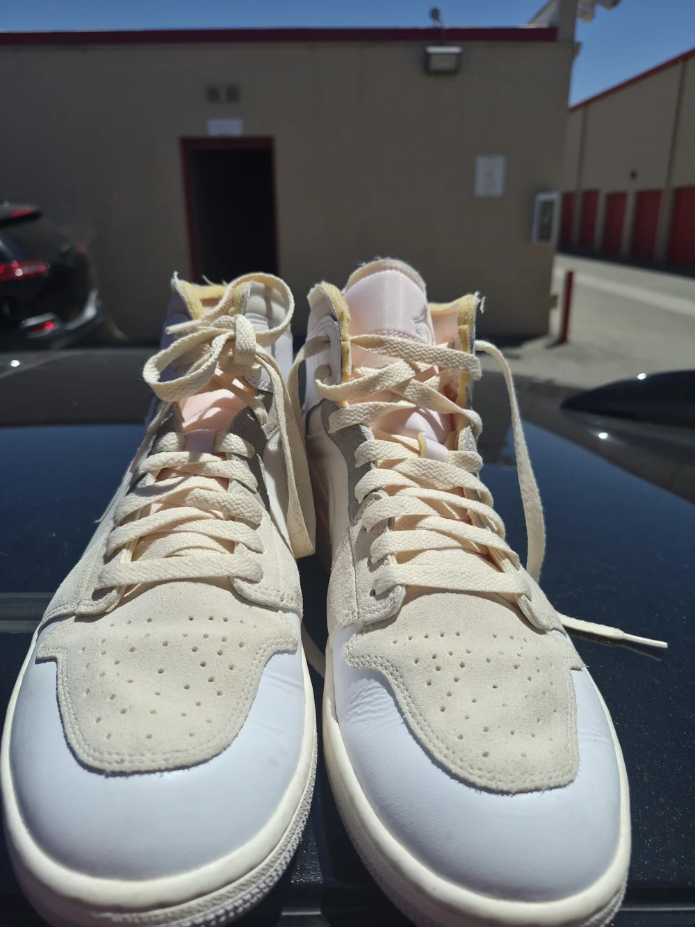 Jordan Men's 1 Mid Top Sneakers in Cream and White